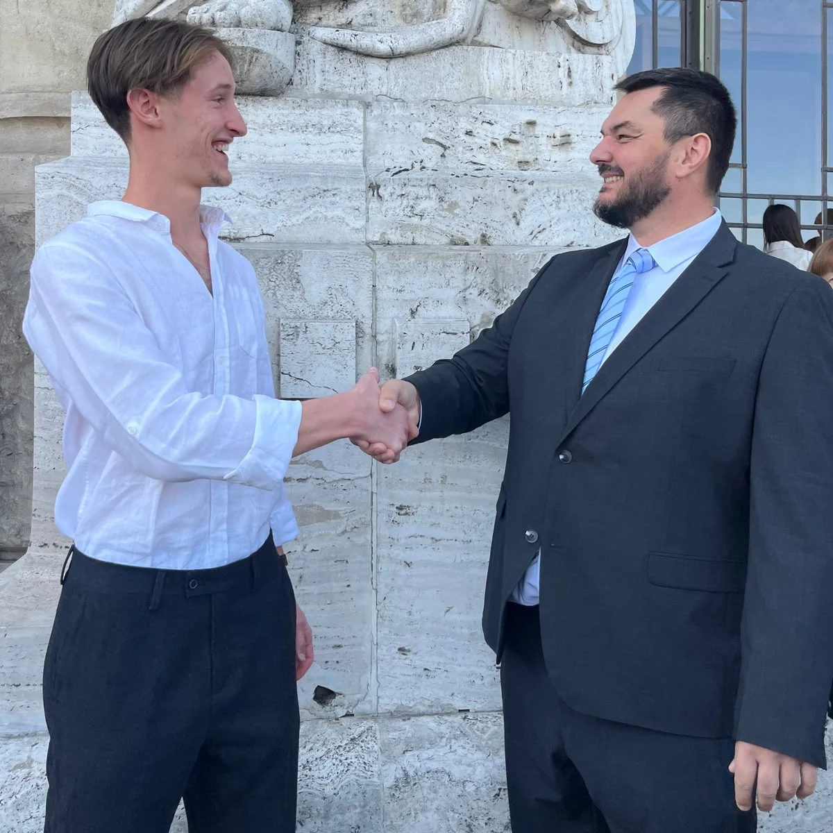 Nathan Goutagny shaking hands with Kis Zoltán, in Budapest